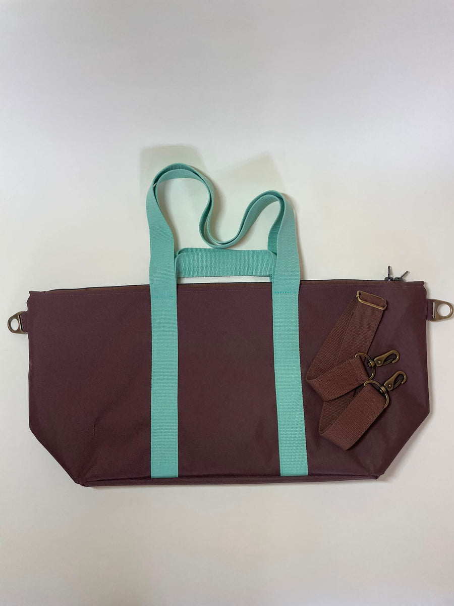 Jukta Sport, Aubergine-Türkis